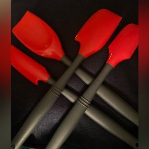 4 Le Creuset red utensils